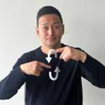 「手話」の手話をしている人の写真